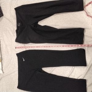 2 black Nike leggings